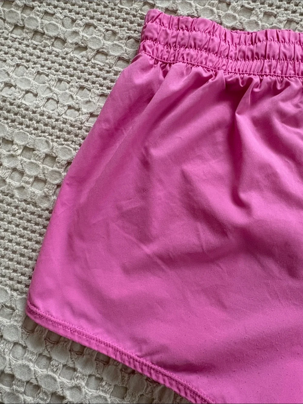 Nike Girl’s Pink Athletic Shorts with White Swoosh